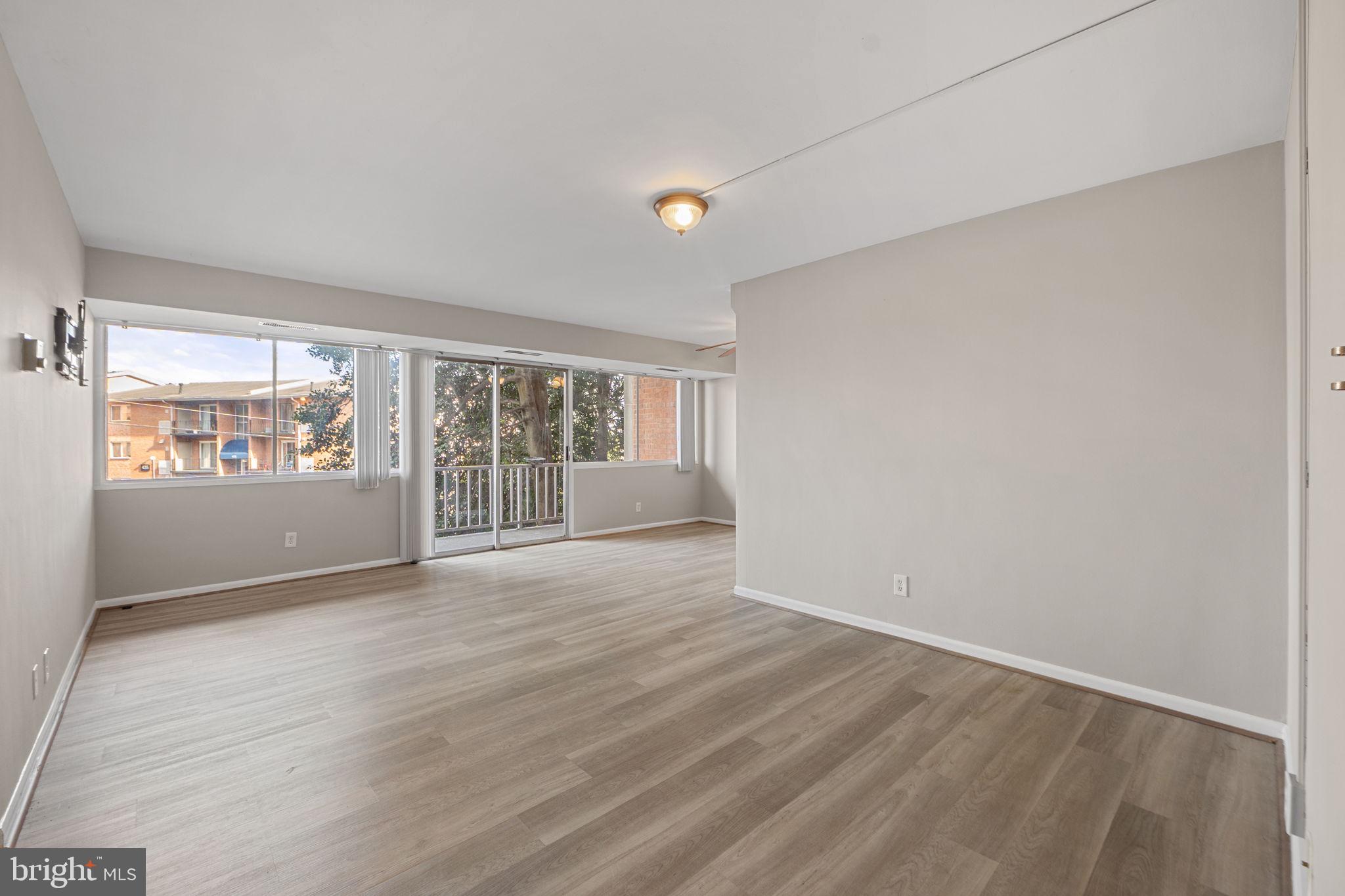 431 North Armistead Street, Unit 211 Alexandria, VA 22312 - Photo 12 of 27 a view of an empty room with a window