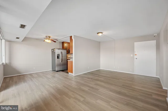 a view of a livingroom with wooden floor