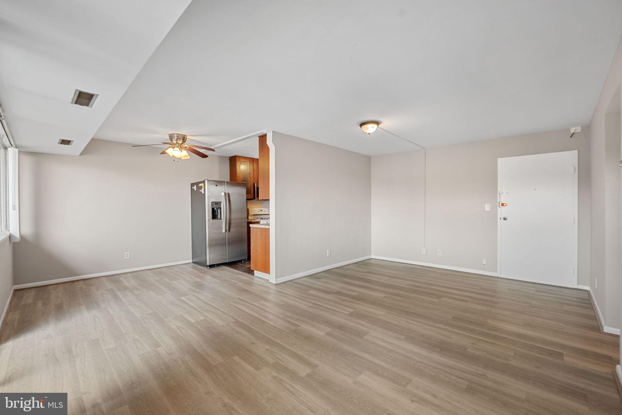 431 North Armistead Street, Unit 211 Alexandria, VA 22312 - Photo 14 of 27 a view of a livingroom with wooden floor
