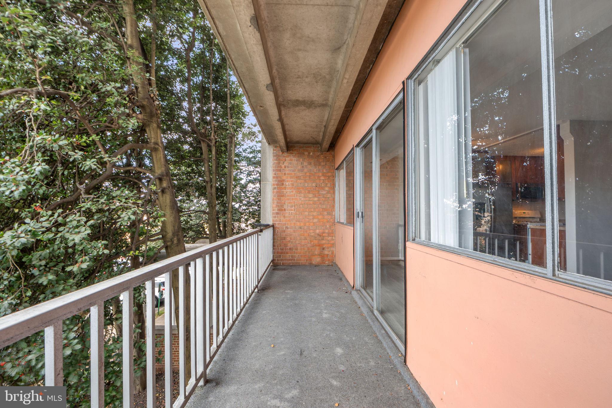 431 North Armistead Street, Unit 211 Alexandria, VA 22312 - Photo 22 of 27 a view of a balcony