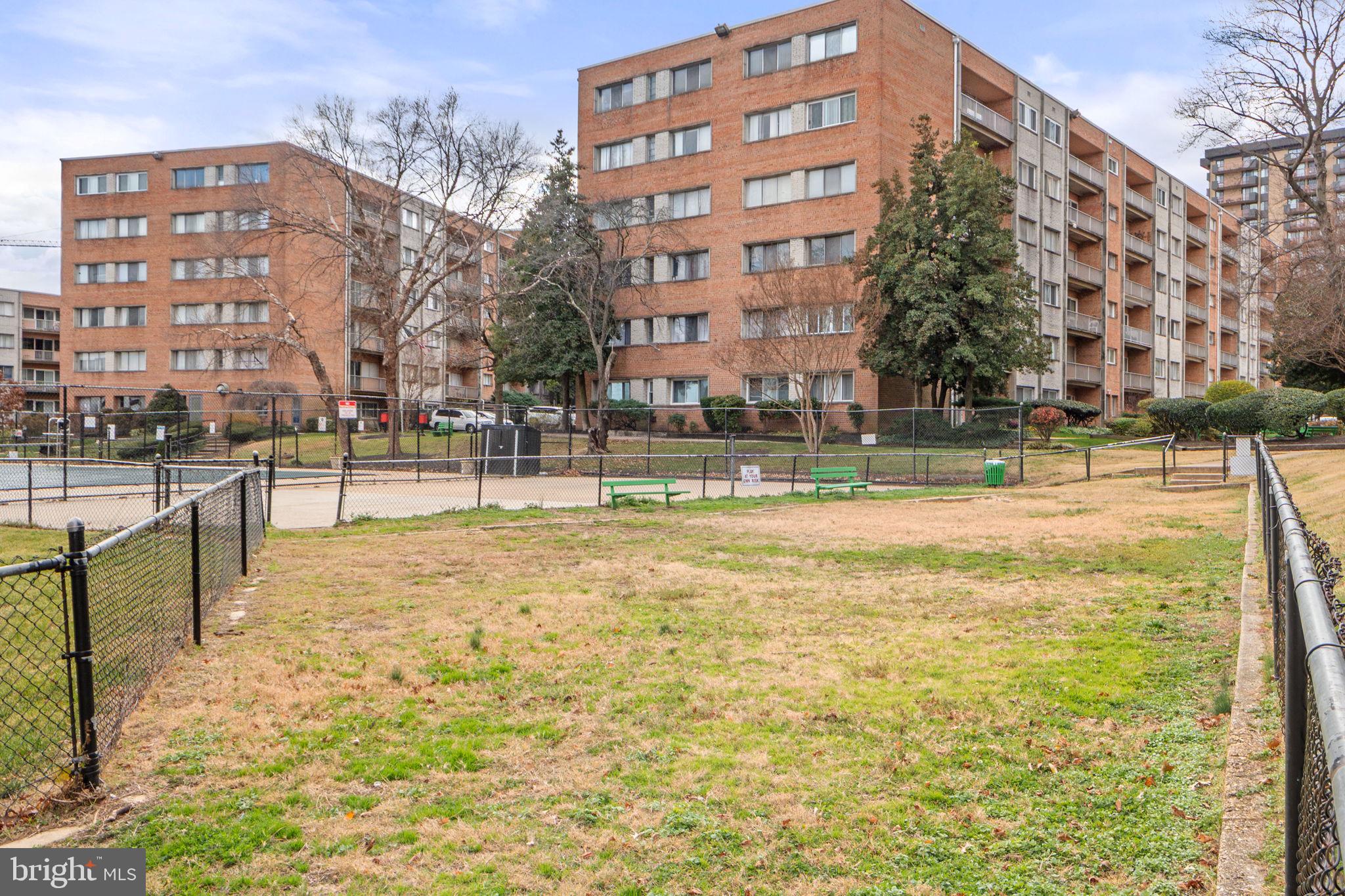 431 North Armistead Street, Unit 211 Alexandria, VA 22312 - Photo 24 of 27 a view of building with outdoor space