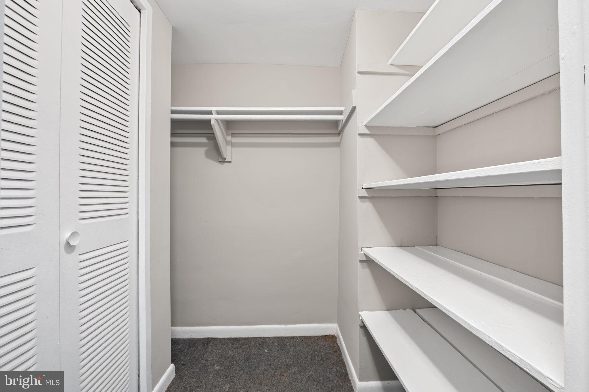 431 North Armistead Street, Unit 211 Alexandria, VA 22312 - Photo 9 of 27 a view of a room with rack on the wall