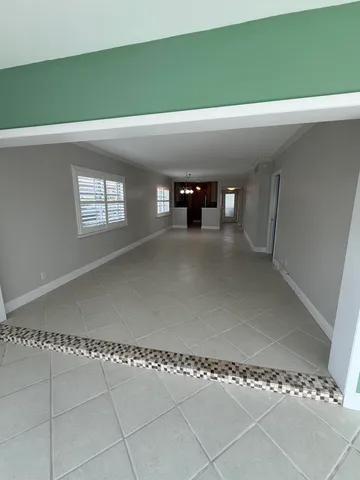 a view of a room that has a window in it