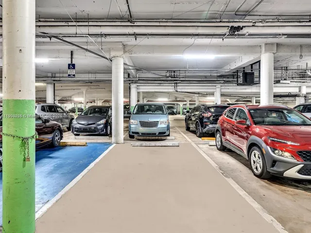 a view of a patio with a table and chairs
