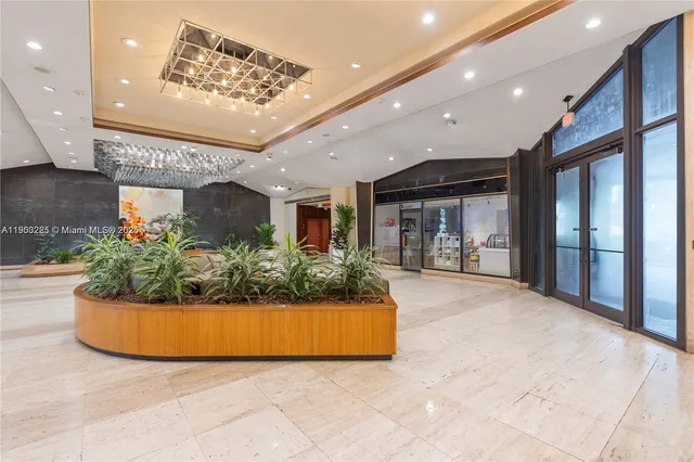 a swimming pool with outdoor seating and yard