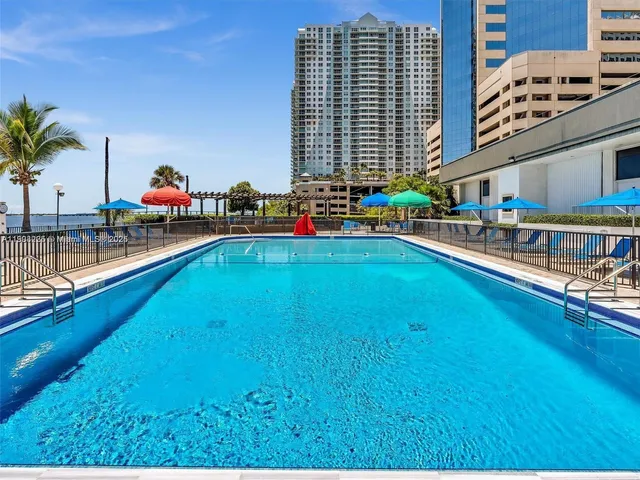 a view of a swimming pool with a patio