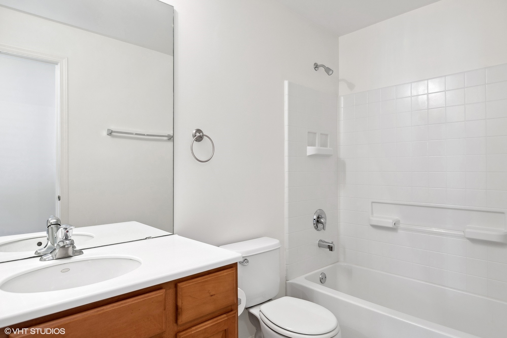 13551 Nealy Road Huntley, IL 60142 - Photo 12 of 15 a bathroom with a sink toilet vanity and shower