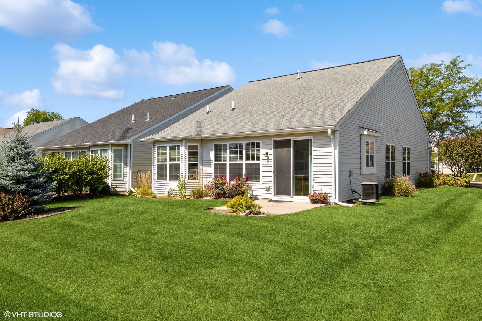 13551 Nealy Road Huntley, IL 60142 - Photo 15 of 15 a house that has sitting area in backyard