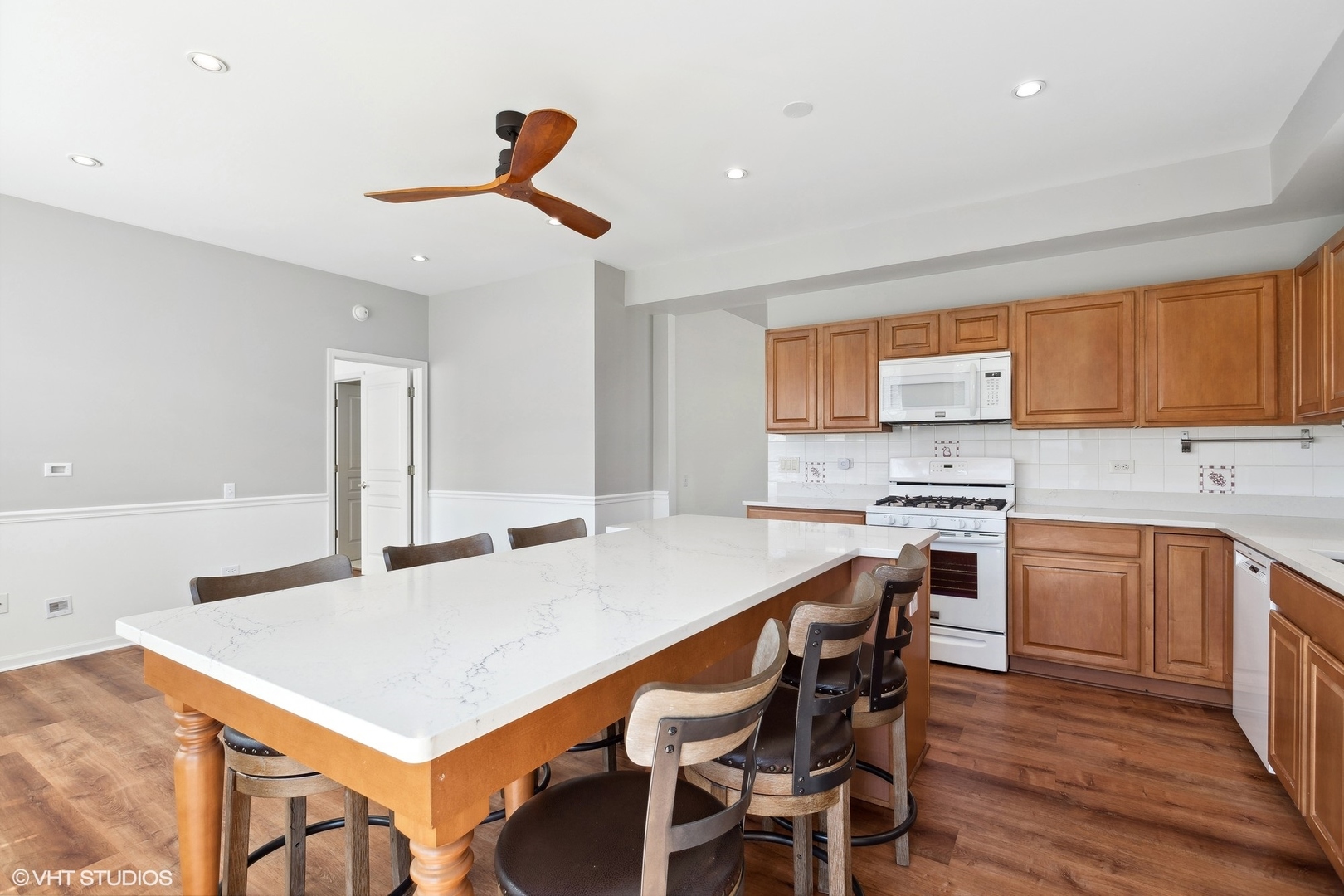 13551 Nealy Road Huntley, IL 60142 - Photo 3 of 15 a kitchen with a stove a sink and a refrigerator