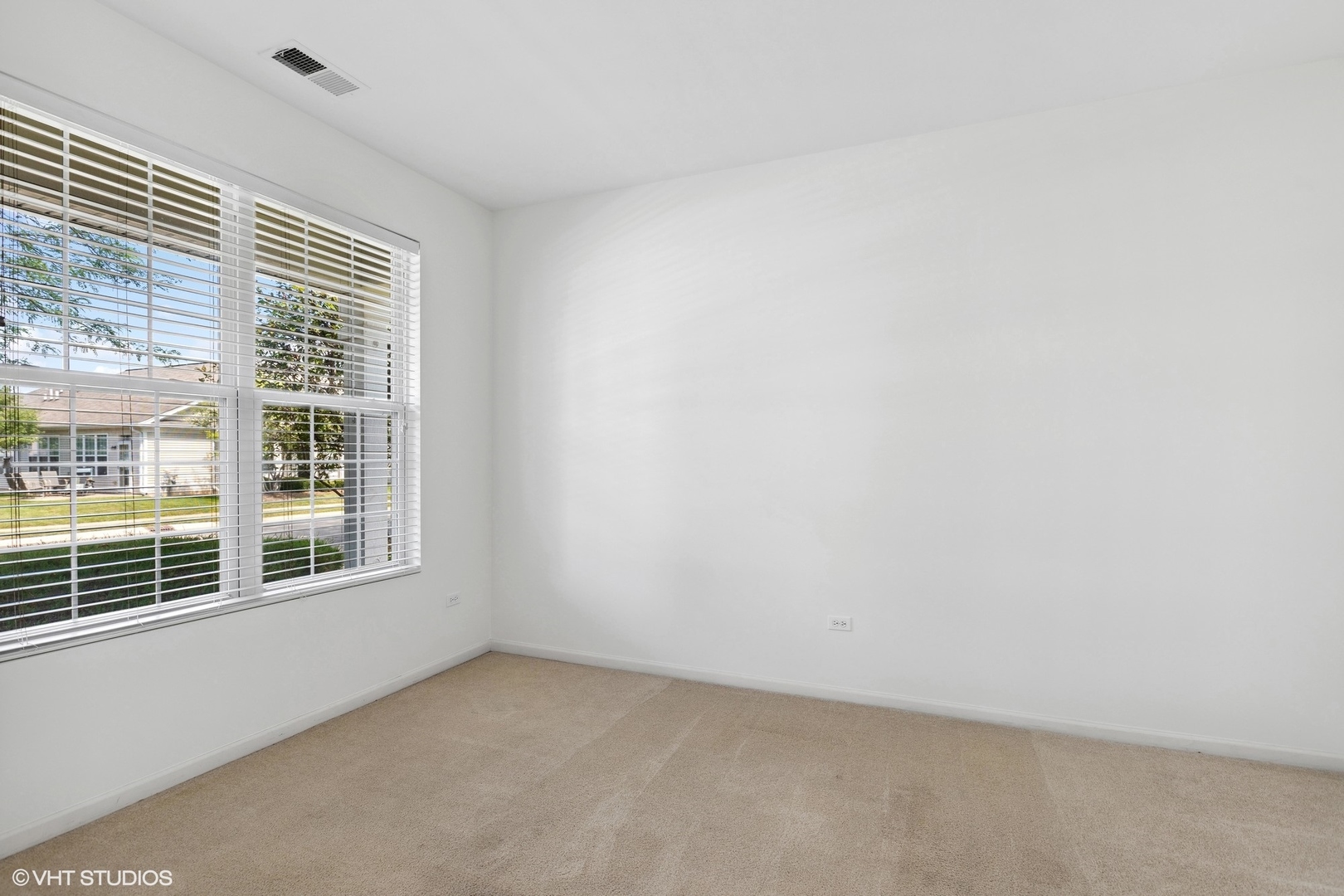 13551 Nealy Road Huntley, IL 60142 - Photo 10 of 15 a view of an empty room with a window