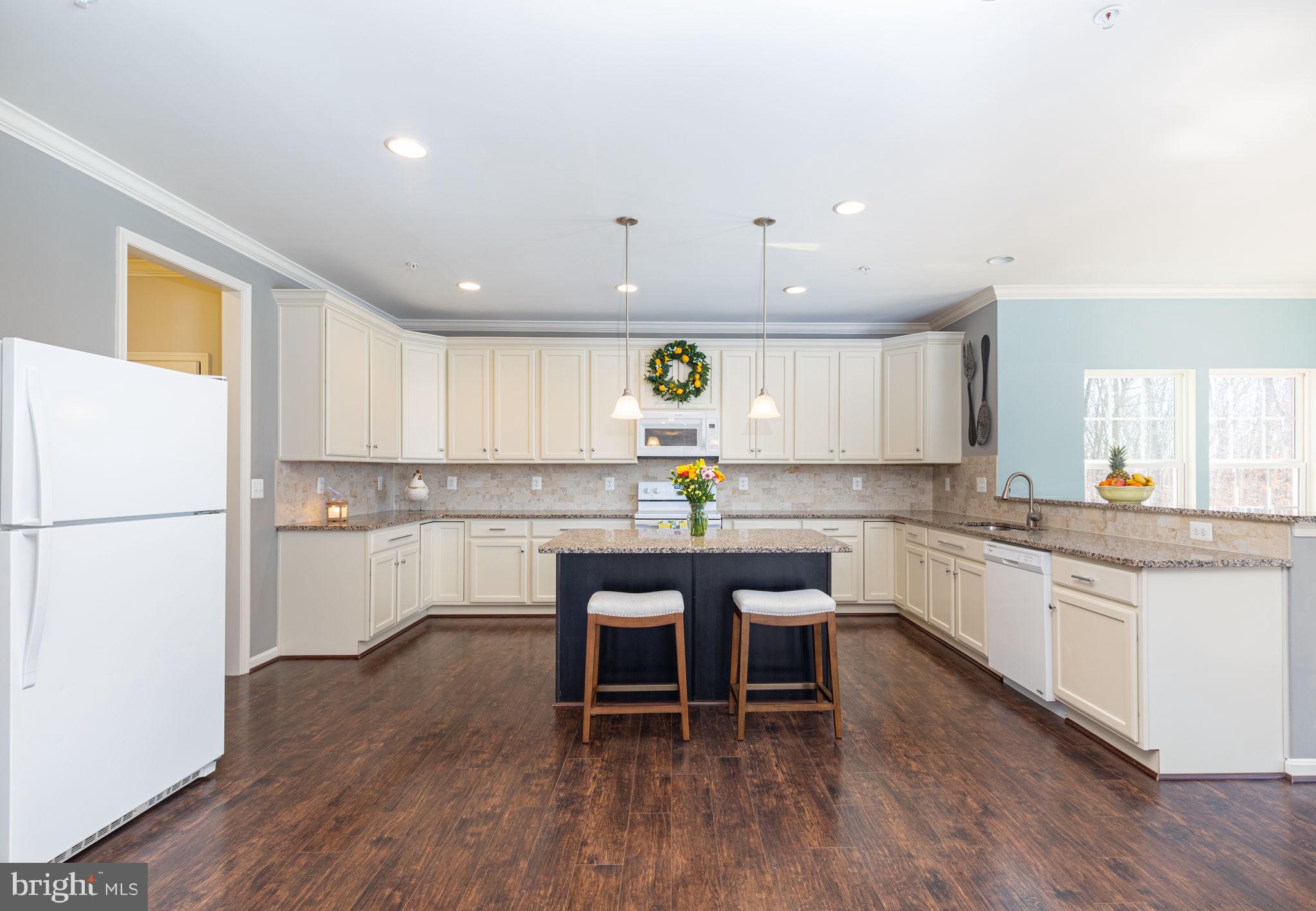 4759 Carea Road White Hall, MD 21161 - Photo 15 of 40 Open concept kitchen with island and breakfast bar