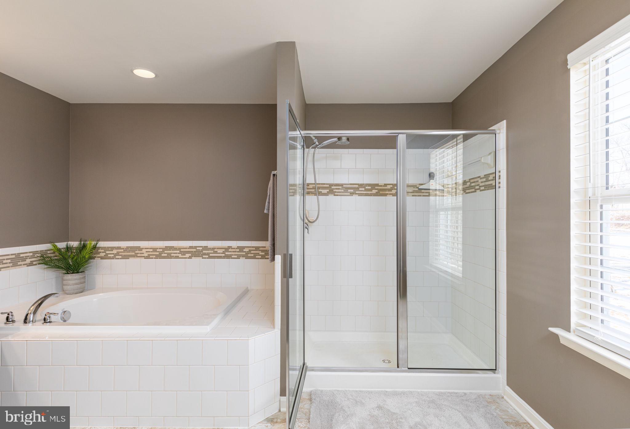 4759 Carea Road White Hall, MD 21161 - Photo 36 of 40 Primary bath soaking tub and shower