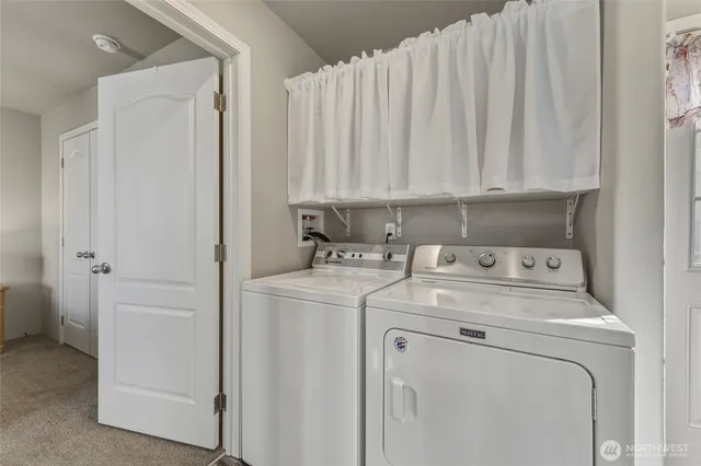 a view of a balcony with furniture