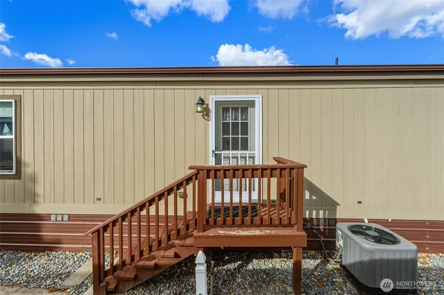 a view of backyard with deck