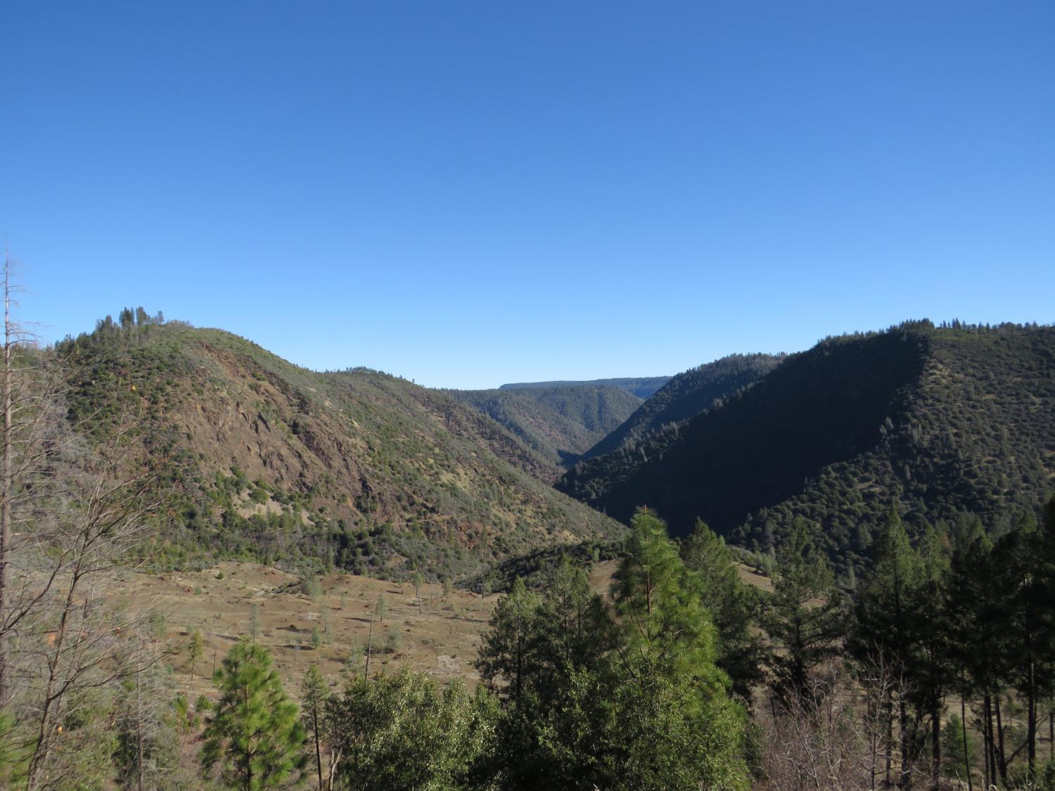 0 North Canyon Way Colfax, CA 95713 - Photo 34 of 51 a view of a dry yard with mountains in the background
