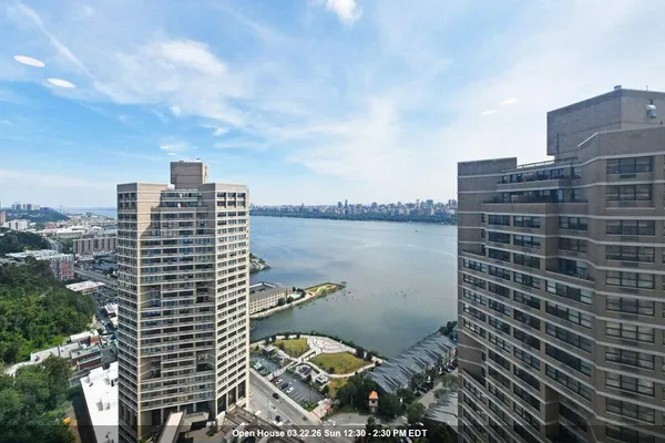 a view of a city with tall buildings