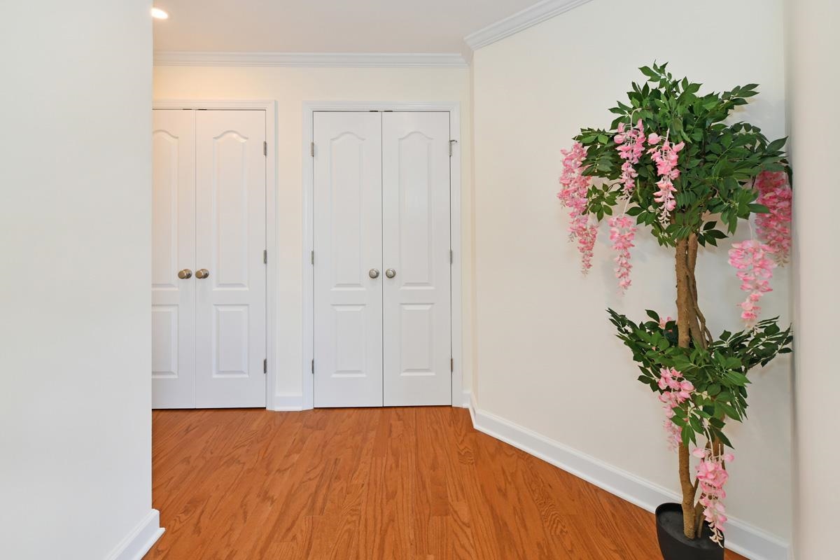 7000 Boulevard East, Unit 43H Guttenberg, NJ 07093 - Photo 5 of 8 a view of an empty room with a chandelier