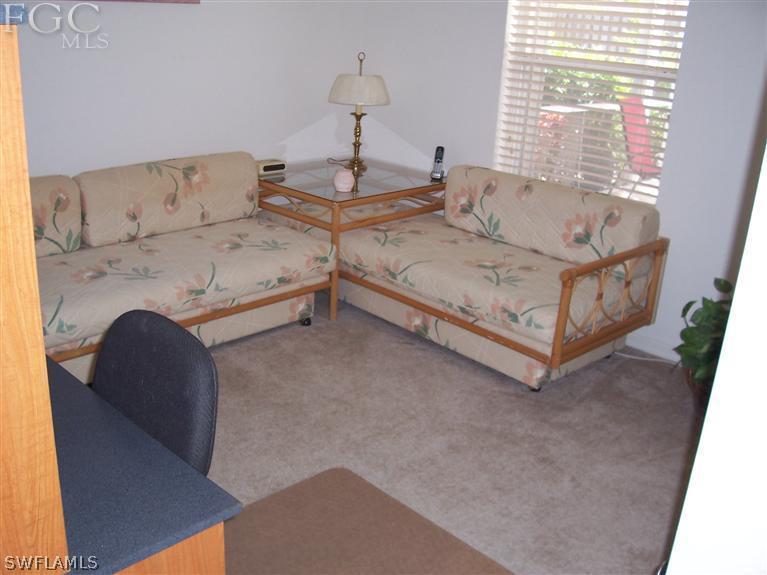 15669 Spring Line Lane Fort Myers, FL 33905 - Photo 4 of 13 a living room with furniture and a window