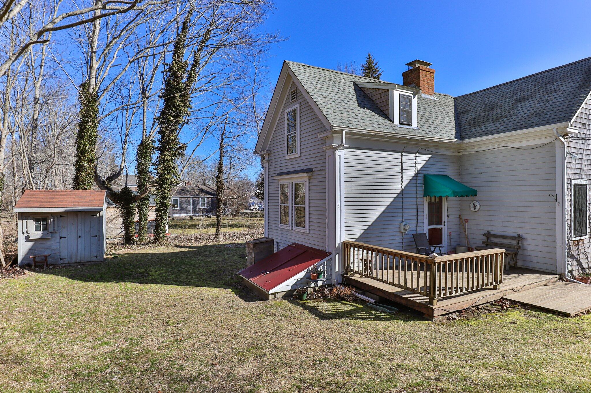 12 Childs Homestead Road Orleans, MA 02653 - Photo 25 of 39 a view of a house with a yard and deck