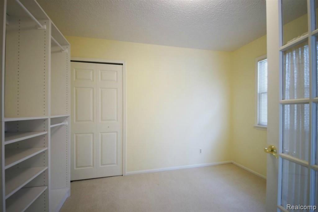 2095 Mason Road Howell, MI 48843 - Photo 15 of 23 Huge master bedroom walk-in closet