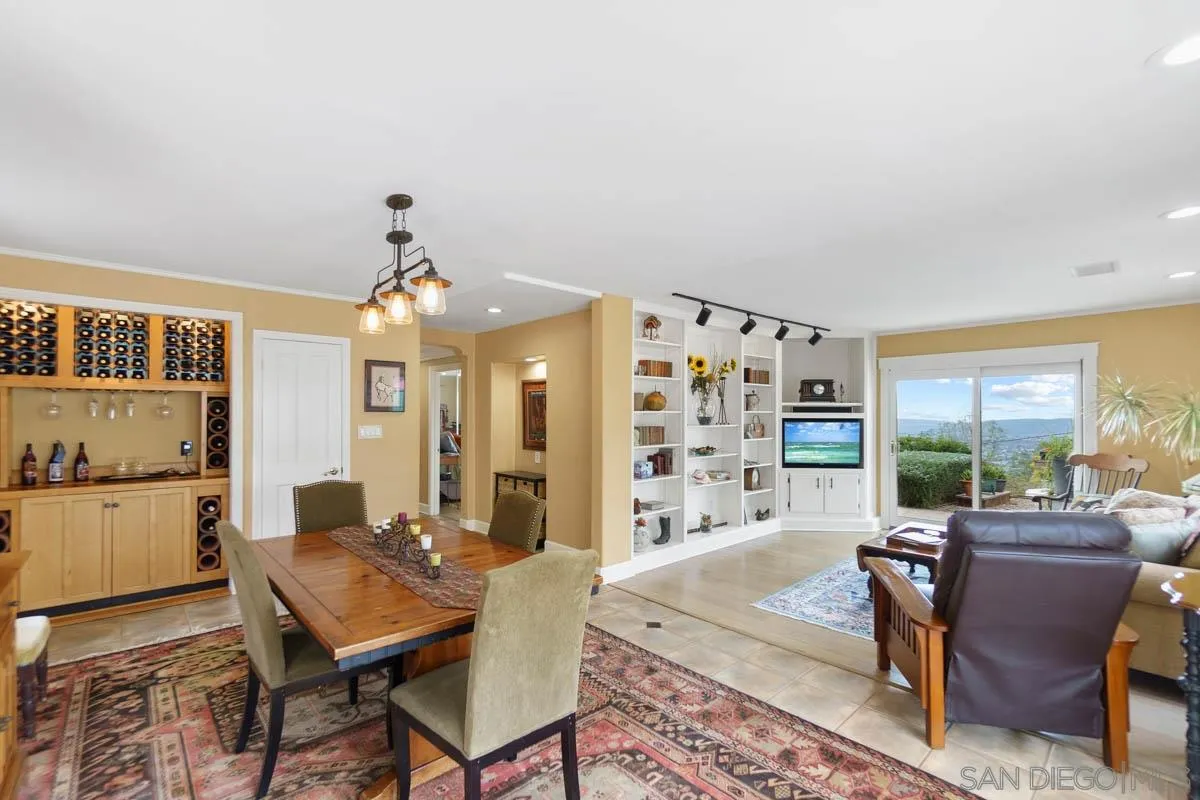 14770 High Valley Road Poway, CA 92064 - Photo 14 of 32 a dining room with furniture and window