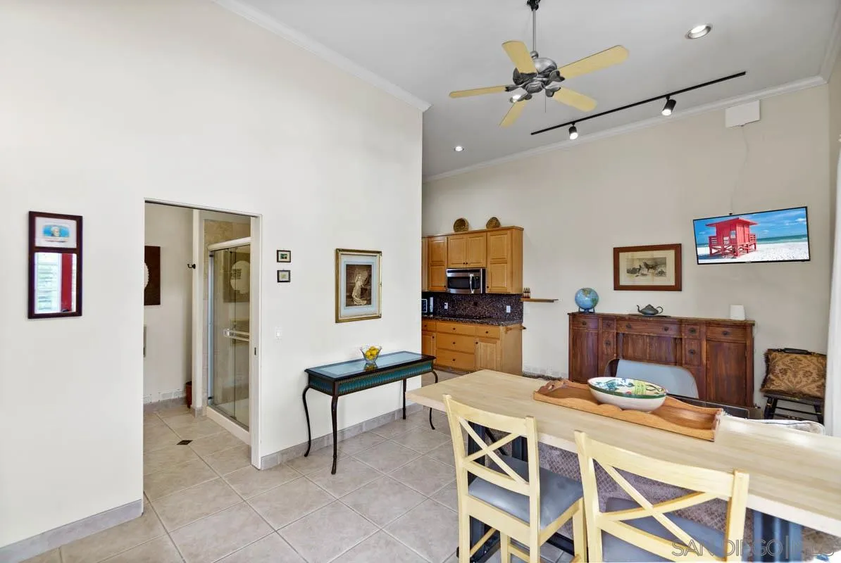 14770 High Valley Road Poway, CA 92064 - Photo 22 of 32 a living room with furniture and kitchen view