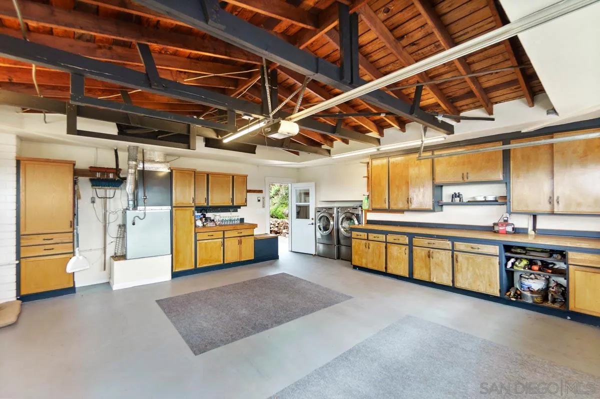 14770 High Valley Road Poway, CA 92064 - Photo 30 of 32 a view of a garage with wooden table