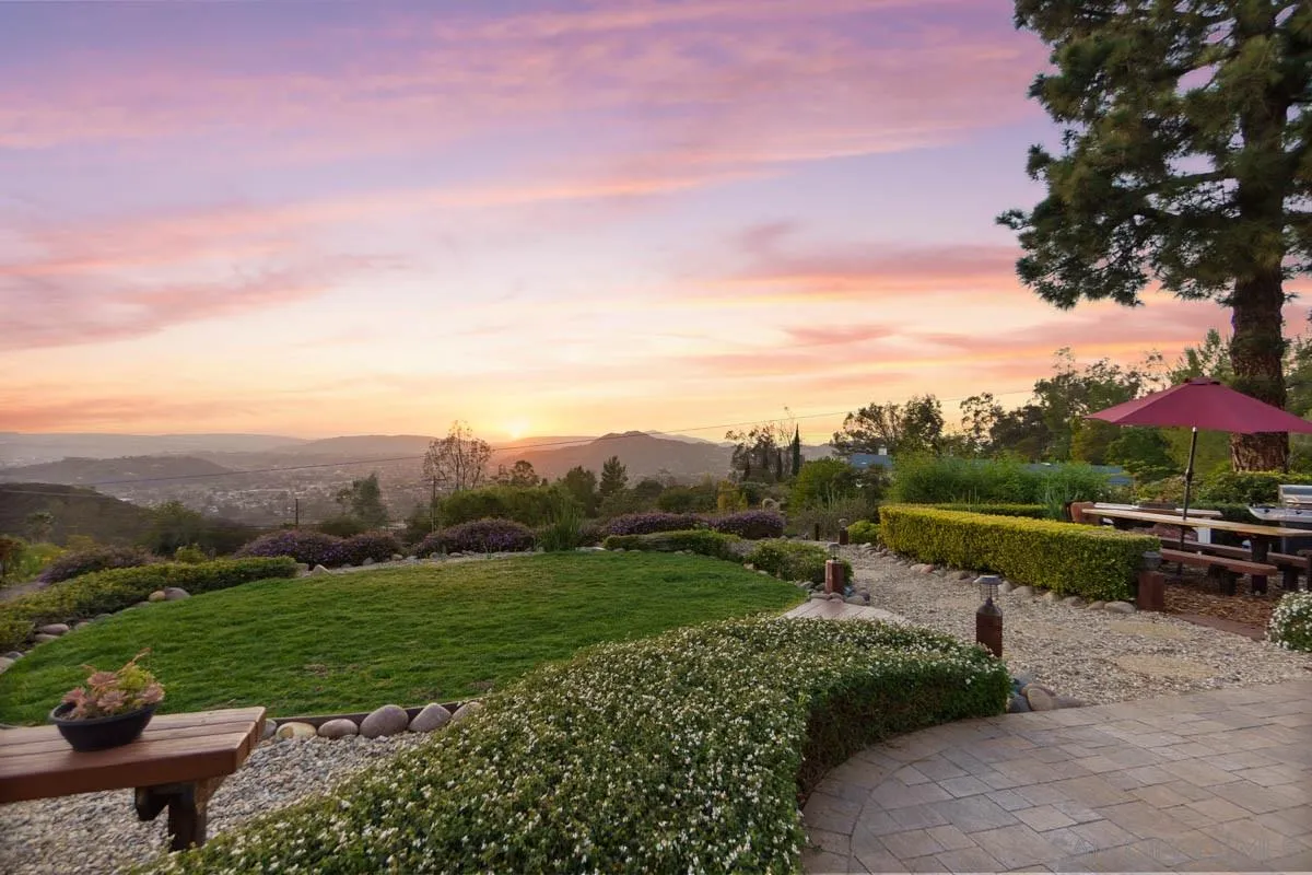 14770 High Valley Road Poway, CA 92064 - Photo 4 of 32 a view of a garden with a lake
