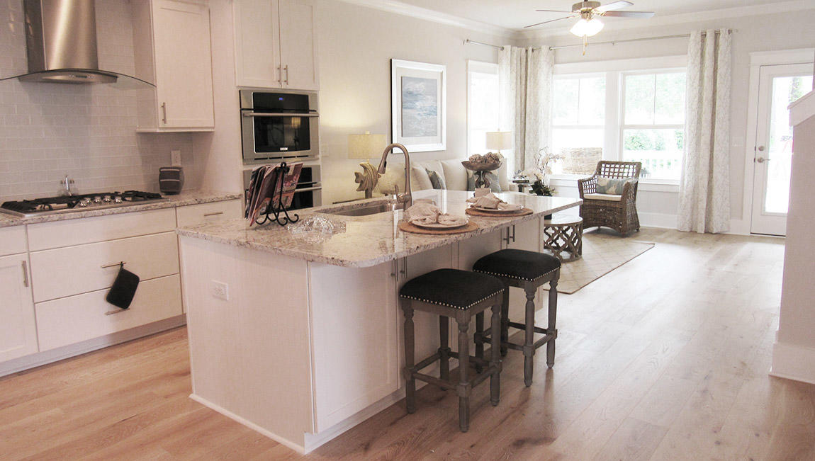 44 Grande Pointe Drive Inlet Beach, FL 32461 - Photo 14 of 54 a kitchen with a table chairs stove and microwave