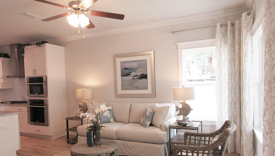 44 Grande Pointe Drive Inlet Beach, FL 32461 - Photo 18 of 54 a living room with furniture a chandelier and a window