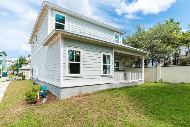 44 Grande Pointe Drive Inlet Beach, FL 32461 - Photo 26 of 54 a view of house with backyard