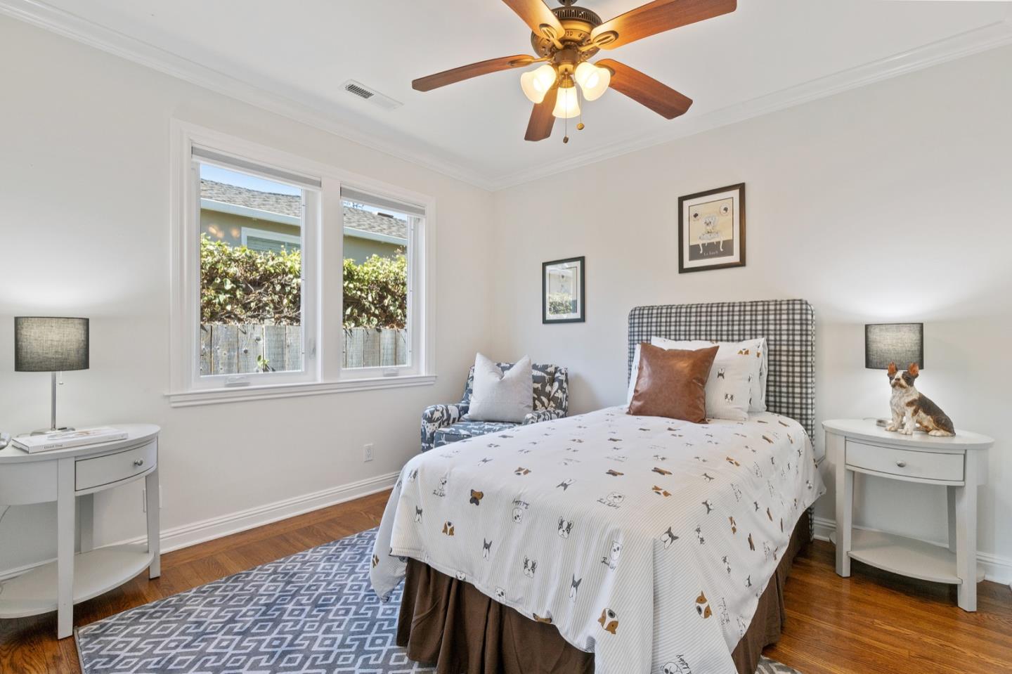 916 Linden Avenue Burlingame, CA 94010 - Photo 21 of 56 a bedroom with a bed and a window