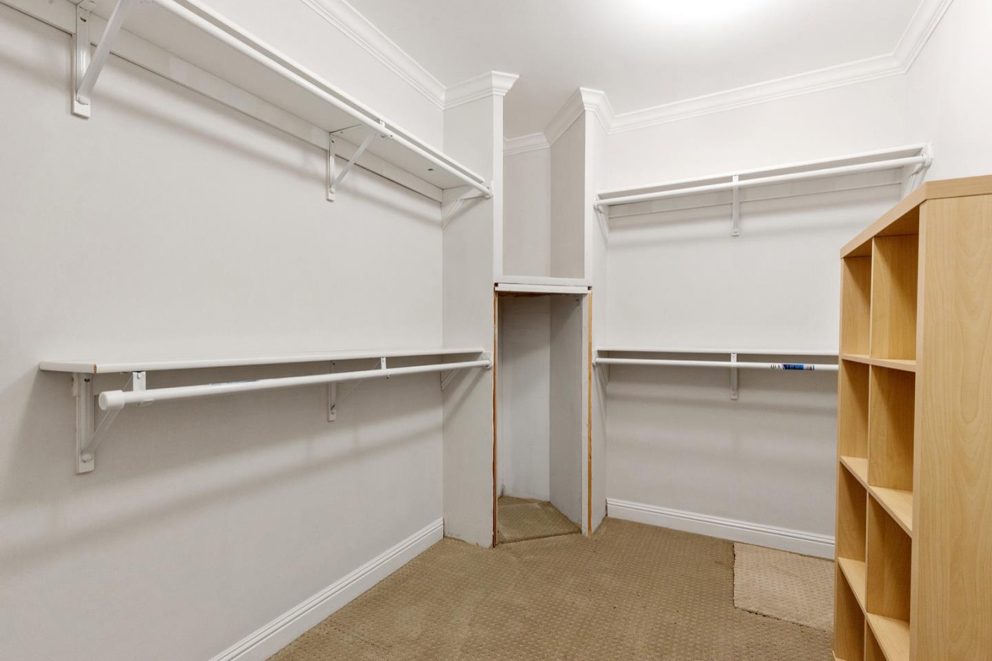 916 Linden Avenue Burlingame, CA 94010 - Photo 29 of 56 a view of walk in closet with empty racks