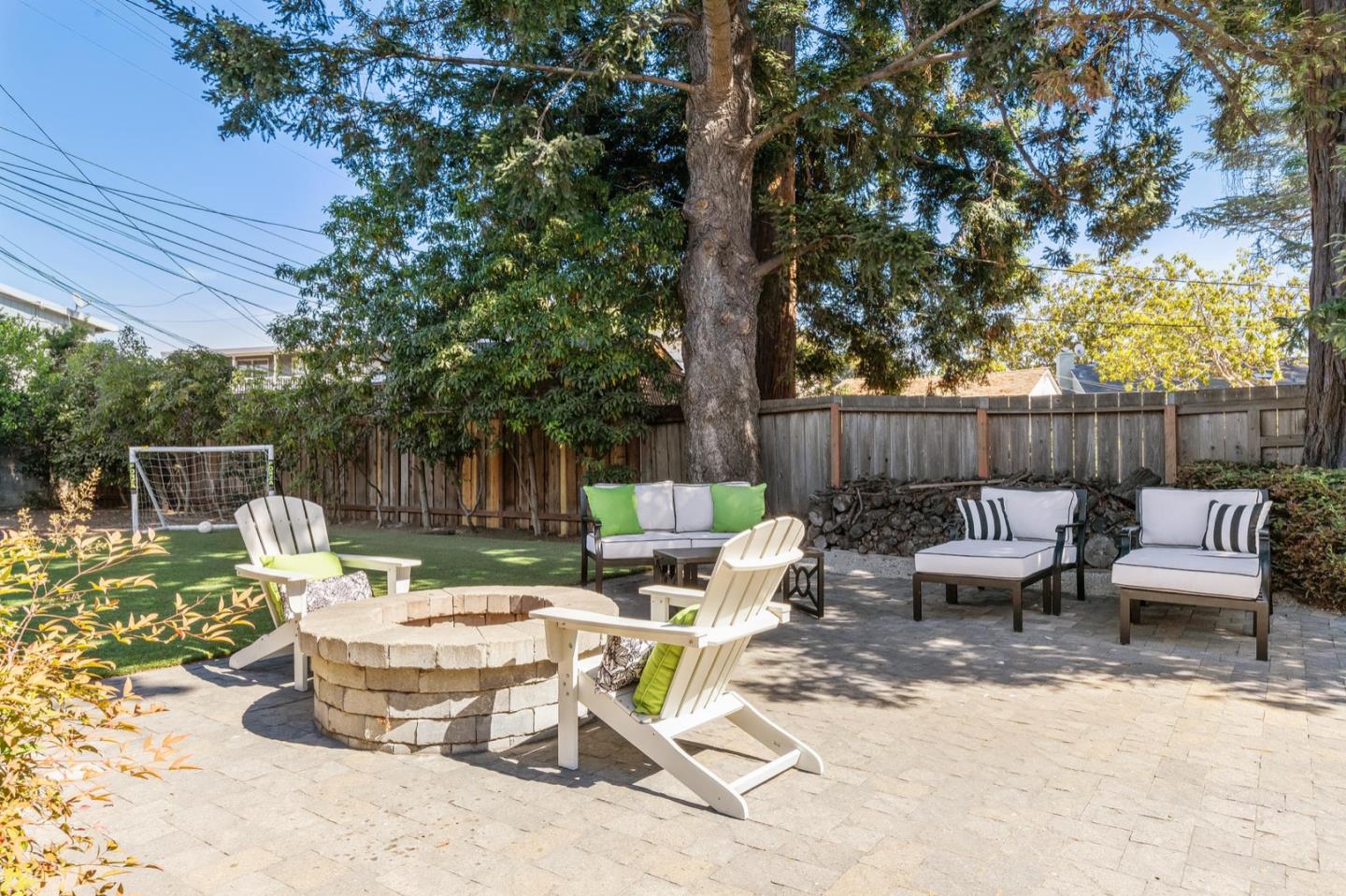 916 Linden Avenue Burlingame, CA 94010 - Photo 37 of 56 a view of a patio with furniture and a fire pit