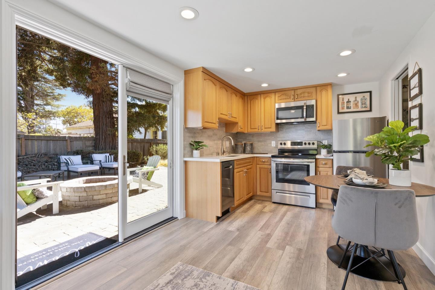 916 Linden Avenue Burlingame, CA 94010 - Photo 51 of 56 a kitchen with a sink appliances cabinets and a counter top space