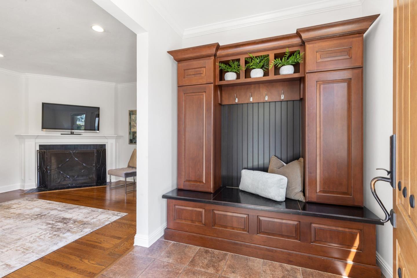 916 Linden Avenue Burlingame, CA 94010 - Photo 6 of 56 a living room with furniture and a fireplace