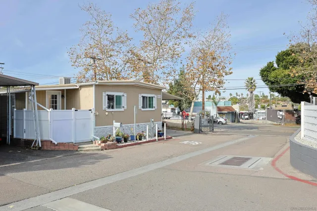 a view of a street with houses