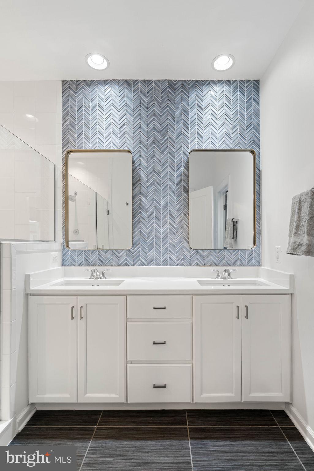 20379 Codman Drive Ashburn, VA 20147 - Photo 35 of 57 Custom designed tile wall, dual vanities