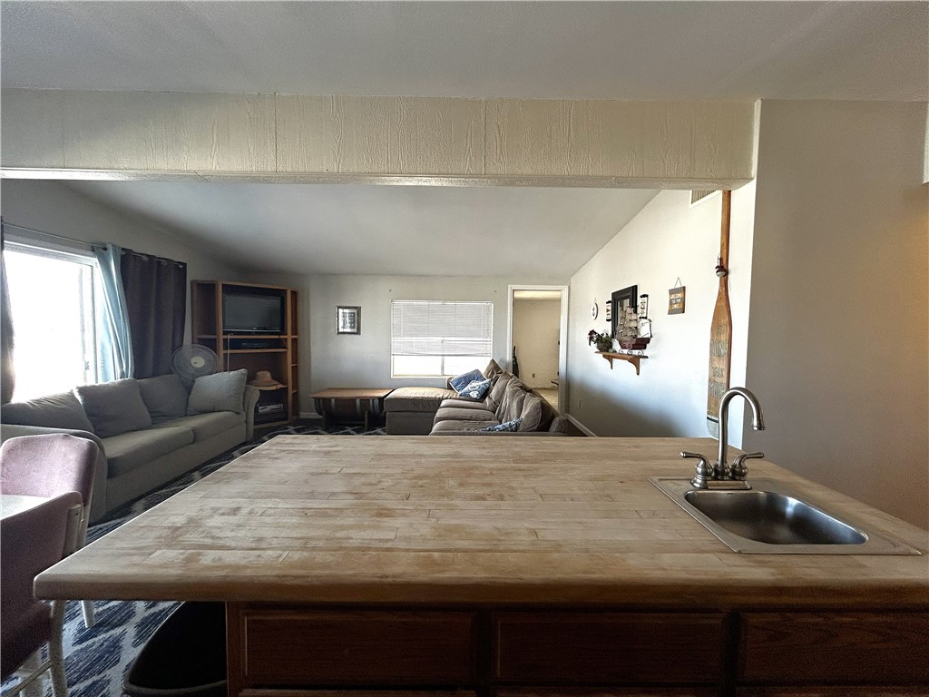 65 2nd Street Needles, CA 92363 - Photo 6 of 14 a view of a livingroom with furniture and window