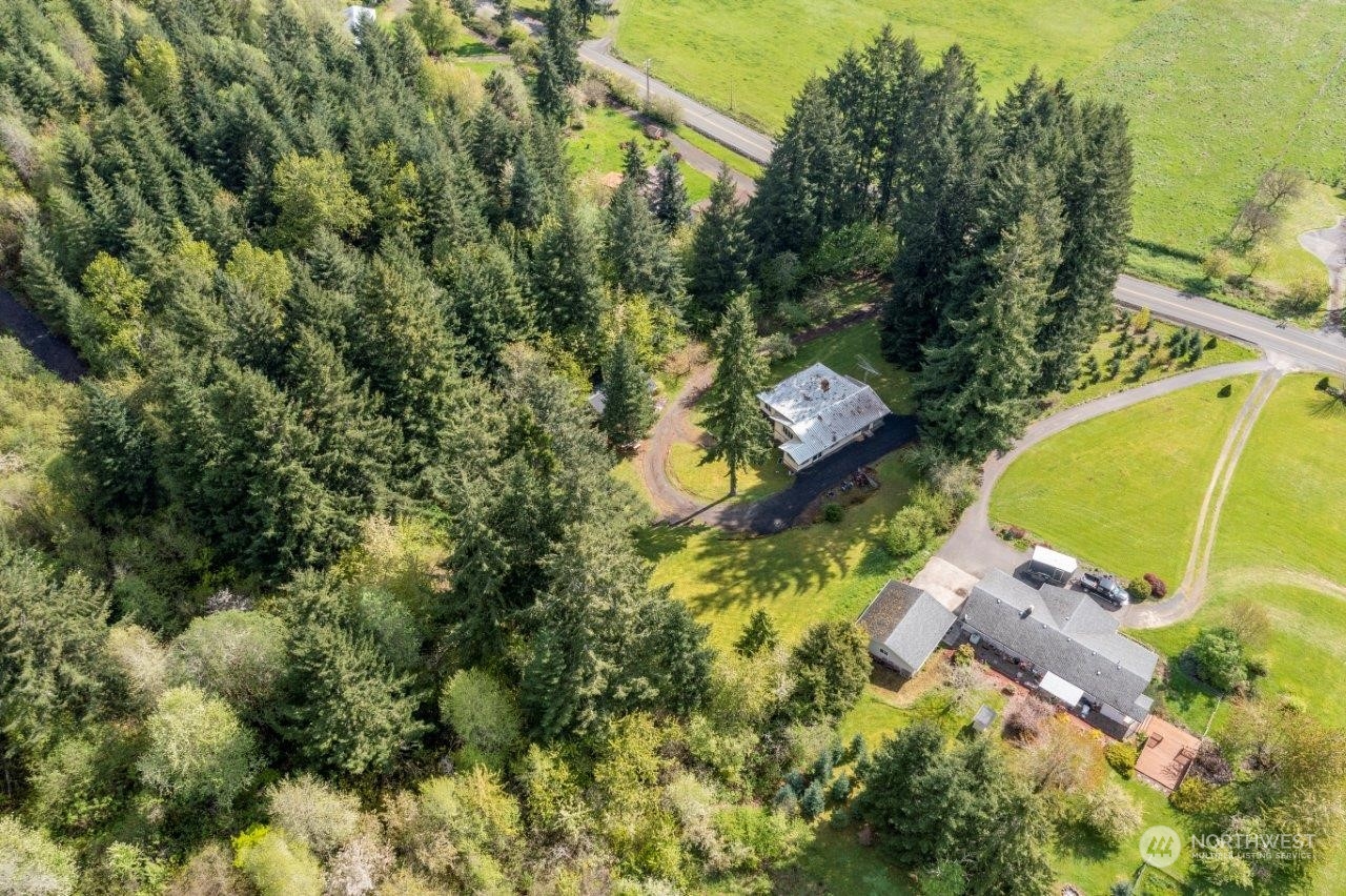 0 Tennessee Road Winlock, WA 98596 - Photo 3 of 4 an aerial view of a house with a yard