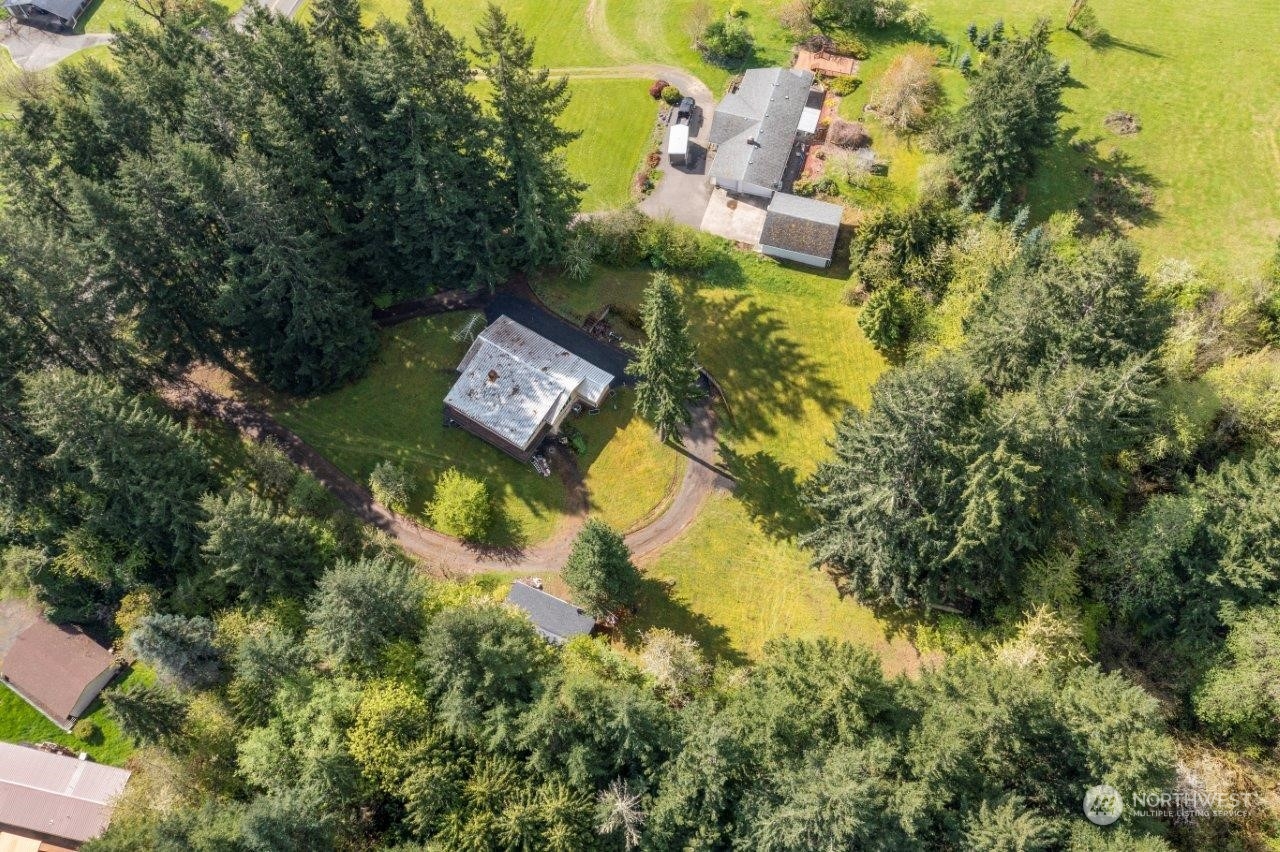 0 Tennessee Road Winlock, WA 98596 - Photo 4 of 4 an aerial view of residential house with outdoor space and trees all around