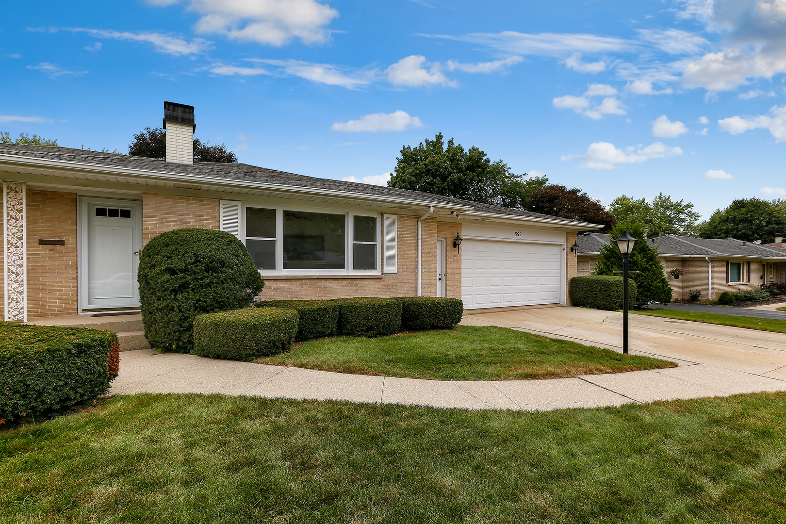 352 North Alfred Avenue Elgin, IL 60123 - Photo 2 of 20 a house view with a outdoor space