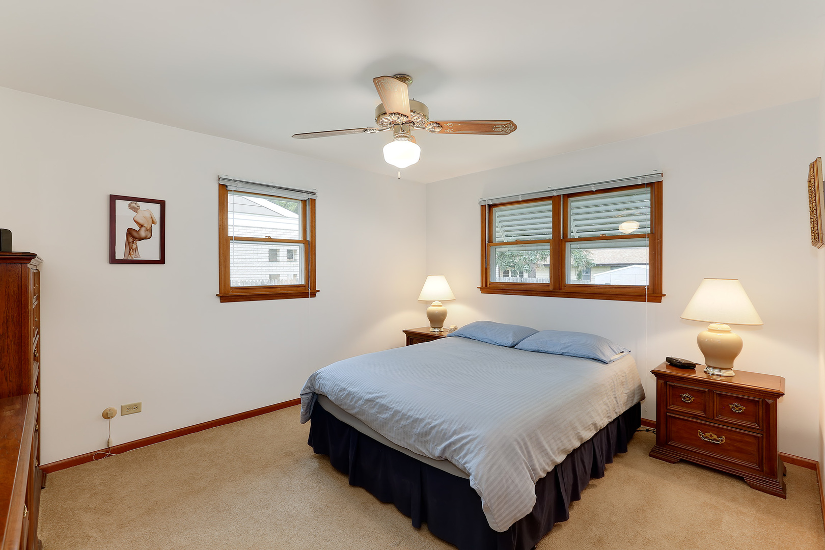 352 North Alfred Avenue Elgin, IL 60123 - Photo 12 of 20 a bedroom with a bed and a window