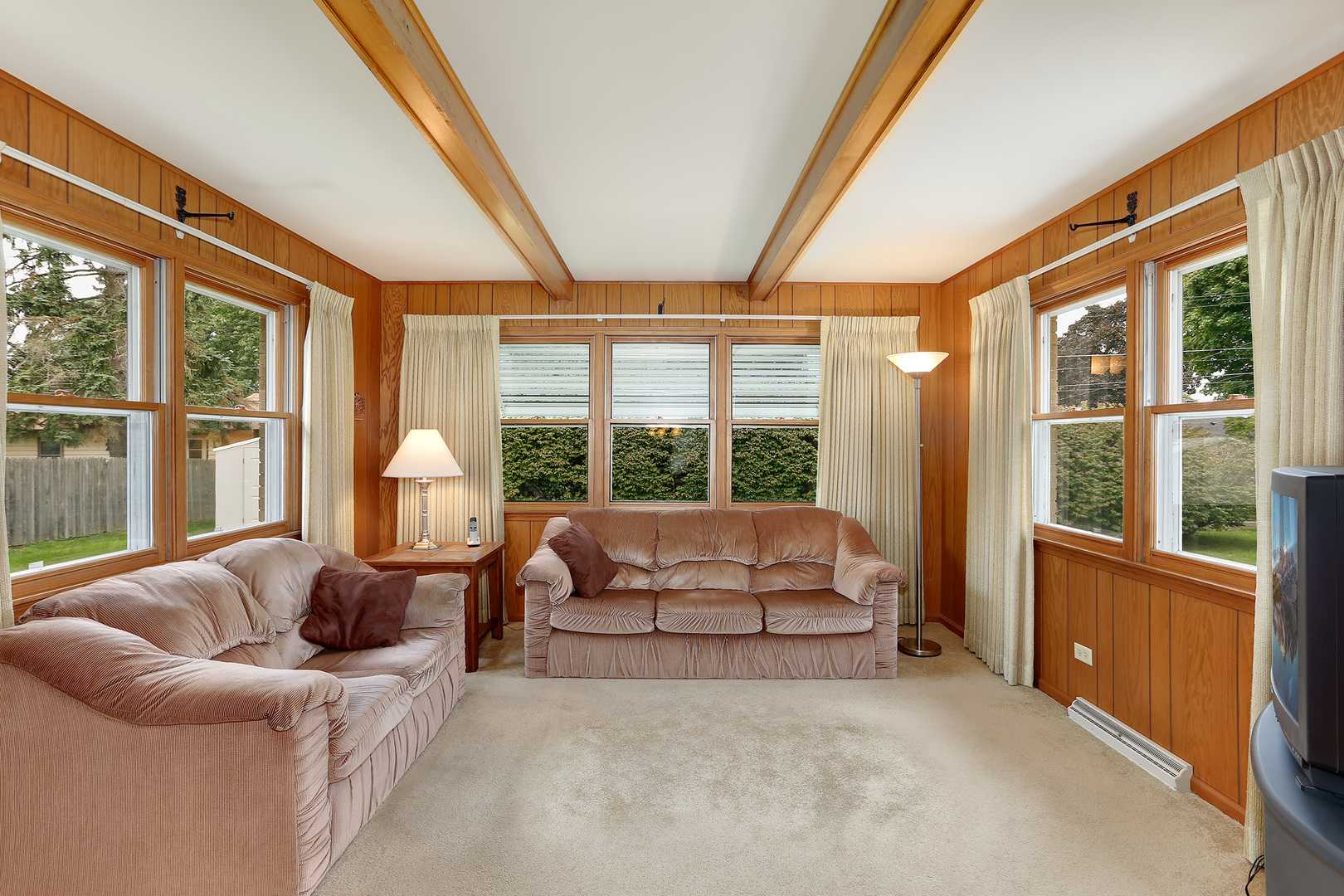 352 North Alfred Avenue Elgin, IL 60123 - Photo 10 of 20 a living room with furniture and a large window