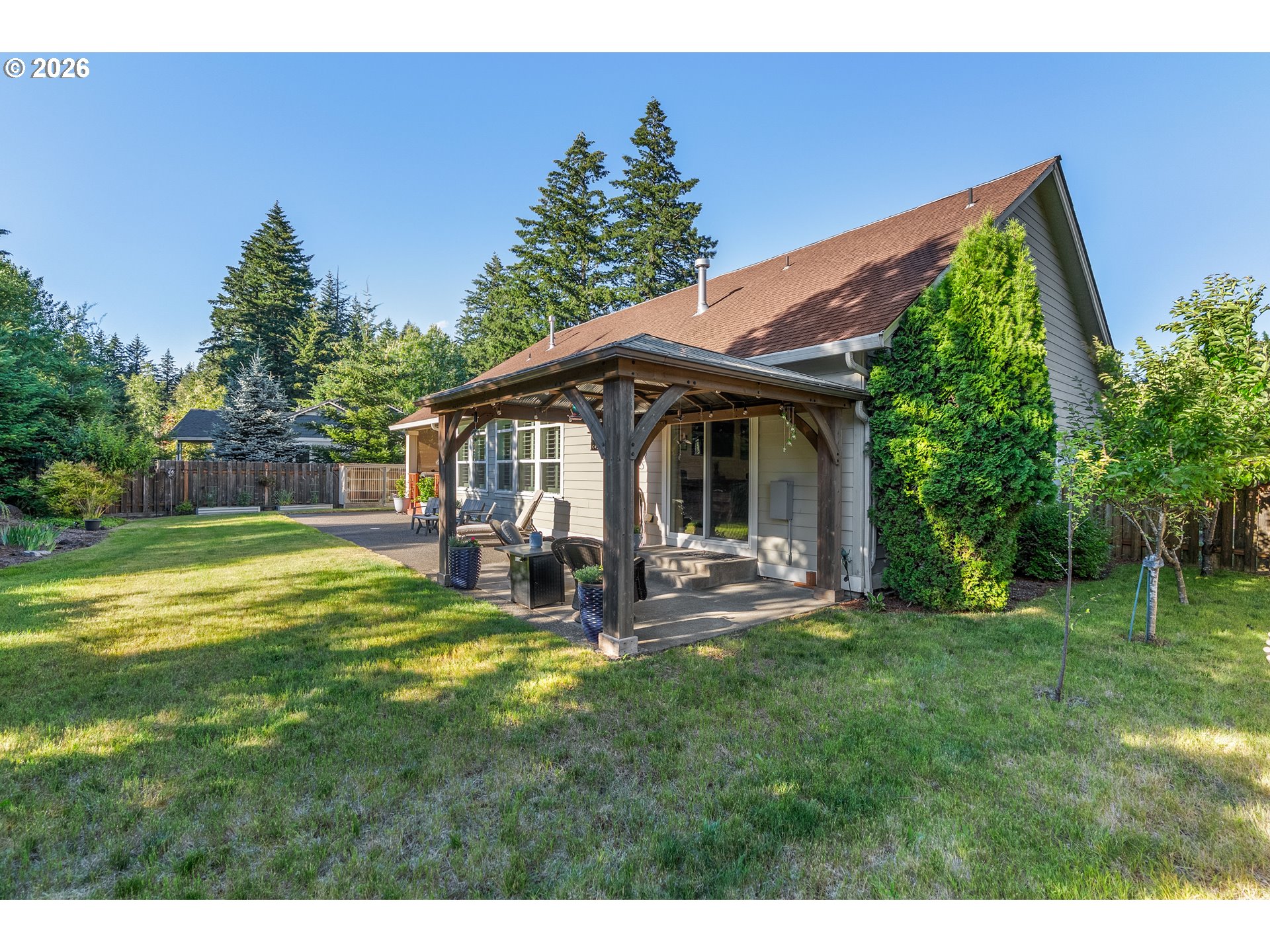 945 Northwest Angel Heights Road Stevenson, WA 98648 - Photo 30 of 41 a view of a house with a yard porch and sitting area