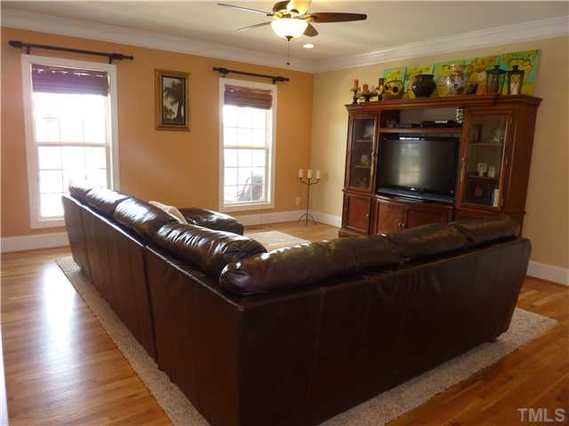 212 Bickett Boulevard Raleigh, NC 27608 - Photo 5 of 20 Huge family room will more than handle all of you furniture or this furniture could be yours!