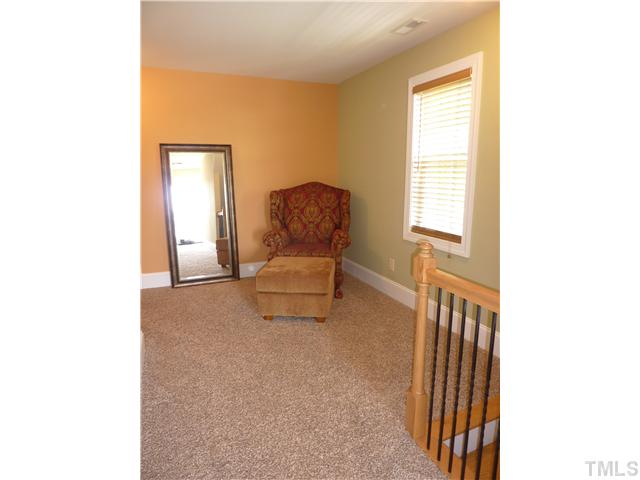 212 Bickett Boulevard Raleigh, NC 27608 - Photo 6 of 20 Quaint nook area at the top of the stairs makes a perfect office or reading area.