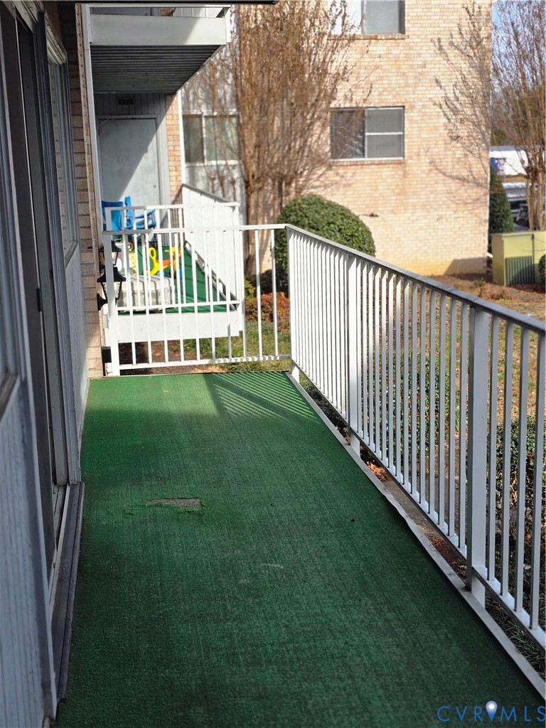 5610 Crenshaw Road, Unit 1221 Richmond, VA 23227 - Photo 12 of 14 a view of a porch with a yard