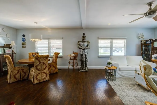 a kitchen with stainless steel appliances granite countertop a refrigerator stove and sink