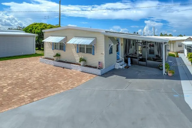 a view of a house with a sitting area